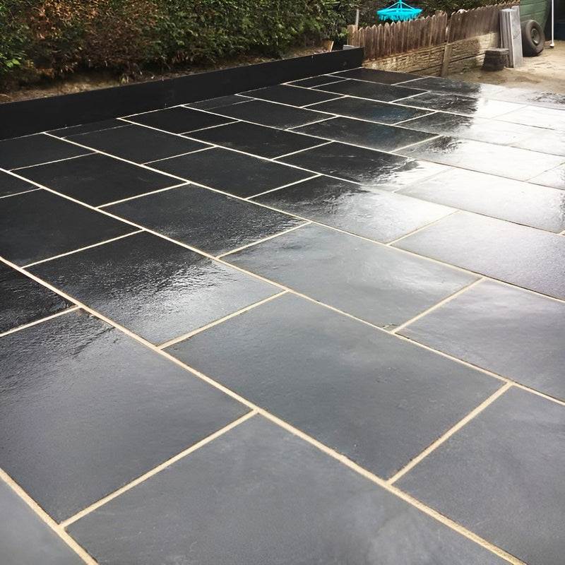 Load image into Gallery viewer, Kota Black Limestone Paving - 900 x 600 x 22mm - Sawn & Riven
