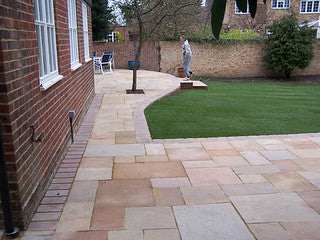 What are the main differences between natural stone paving and porcelain paving?