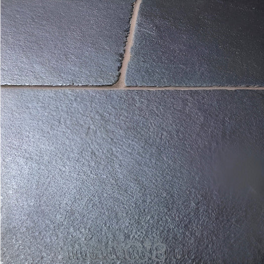 Kota Black Limestone Paving - 900 x 600 x 22mm - Sawn & Riven