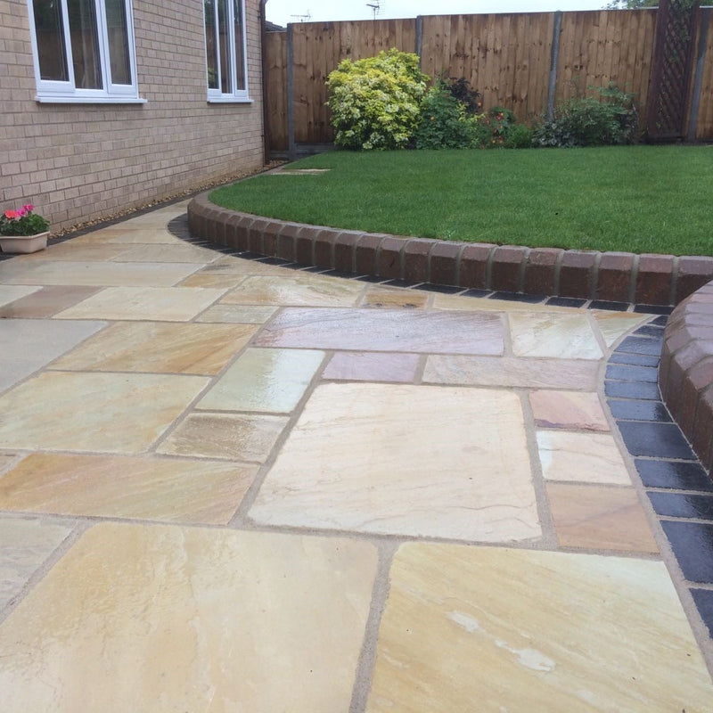 Load image into Gallery viewer, Mint Fossil Indian Sandstone Paving - Patio Pack - Mixed Sizes - Tumbled &amp; Riven
